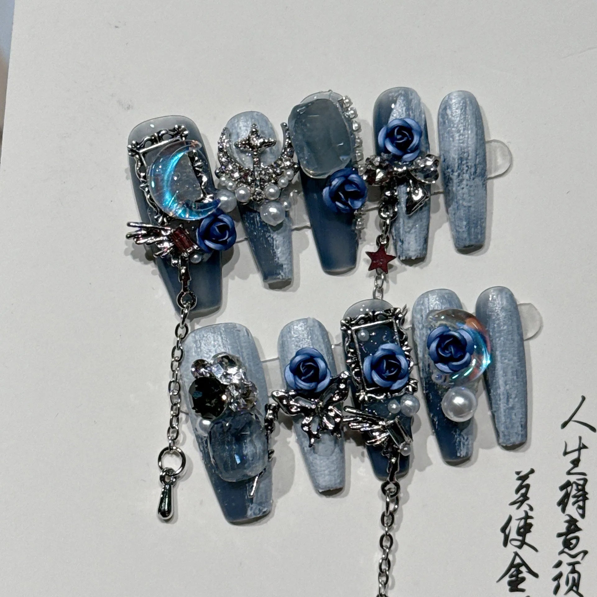 Evening manicure nails with blue rose and tulip patterns in sizes XS to L