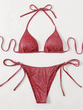 Women's bandage-style bikini swimsuit in polyester available in six colours with detailed size chart