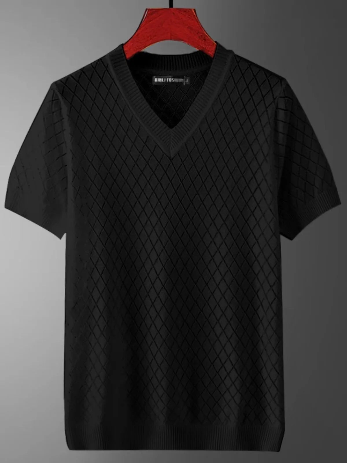 Men's black and white ice silk V-neck and round neck short sleeve t-shirts on hangers.