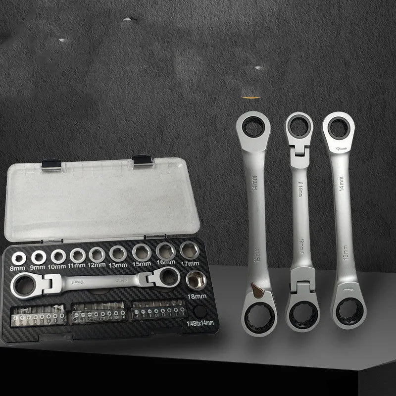 Ratchet wrench set with two-way ratchet mechanism, ten sockets, and three bit heads laid out on a surface