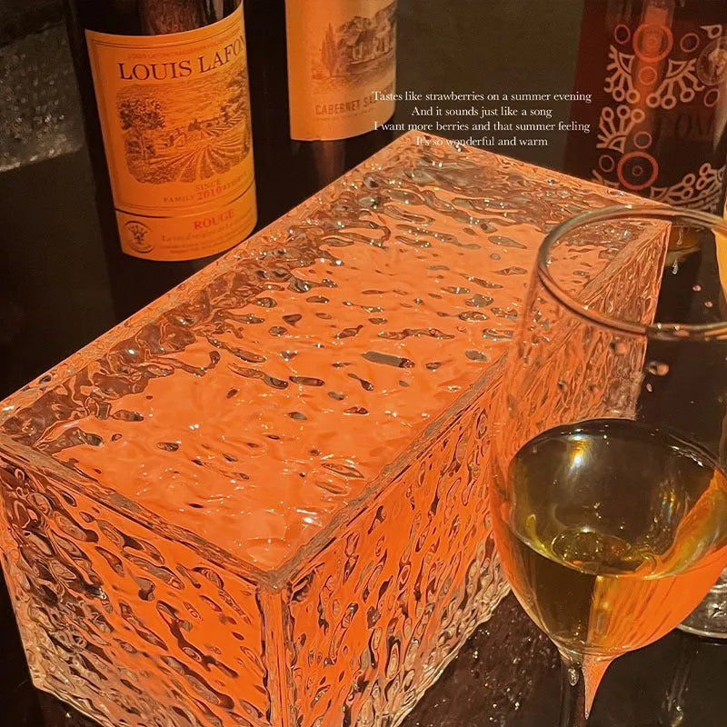 Geometric ice cube acrylic night lamp with multi-colour LED lighting on wooden surface
