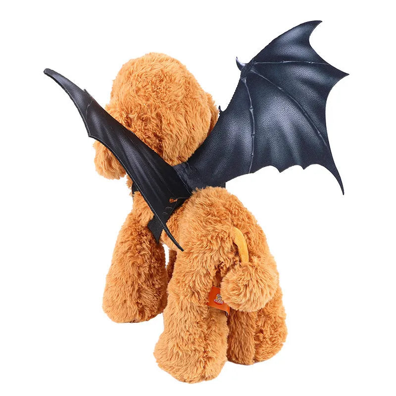 Black cloth bat wings pet costume shown on dog with three size options displayed
