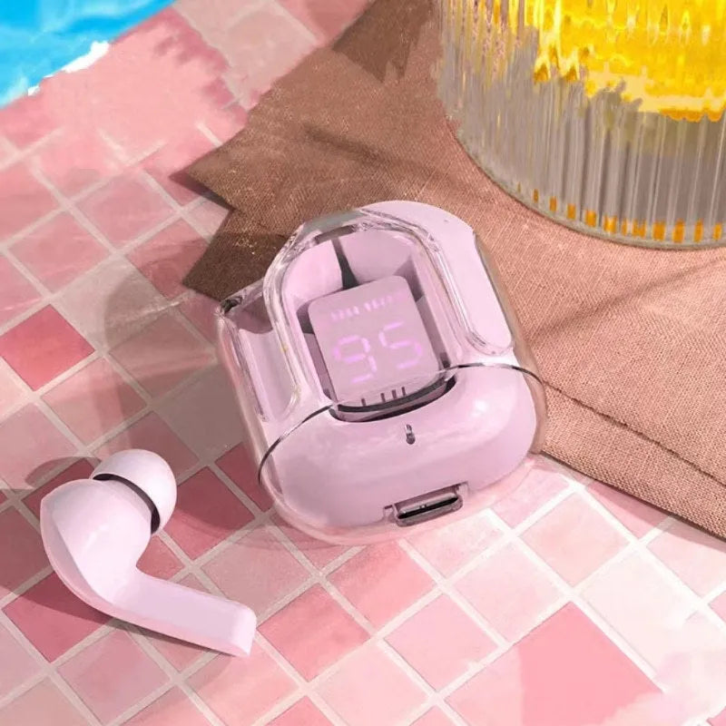 Transparent plastic true wireless Bluetooth headphones showing internal components with digital display charging case