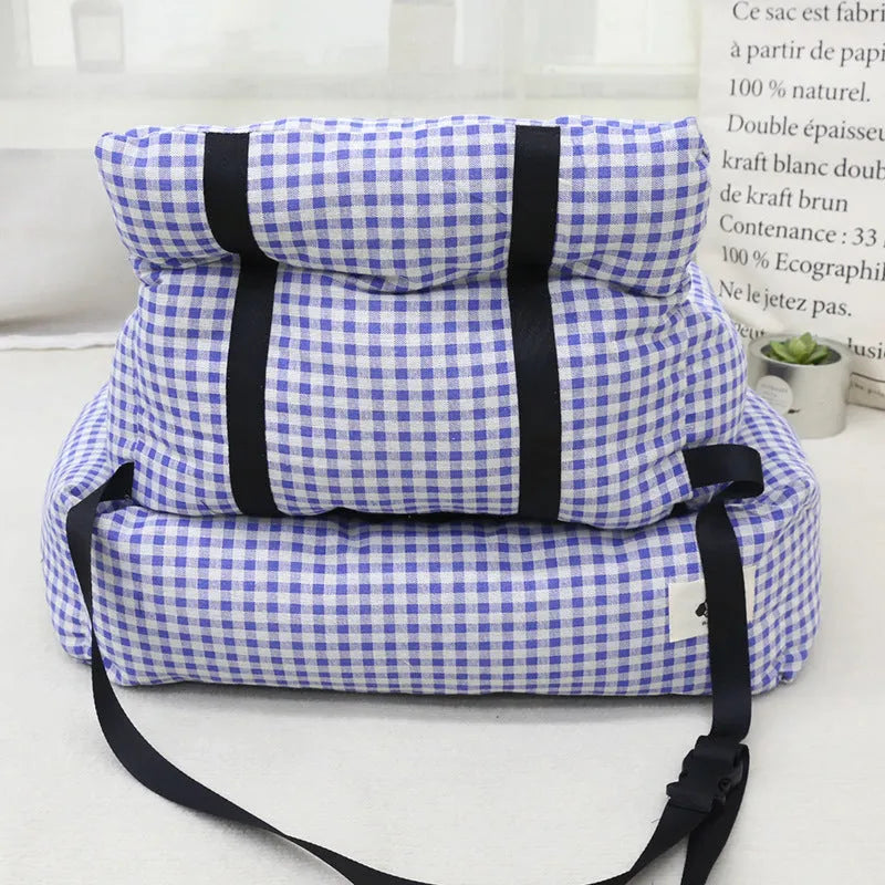 Blue plaid and grey cloth pet travel nests for cars in small and large sizes.