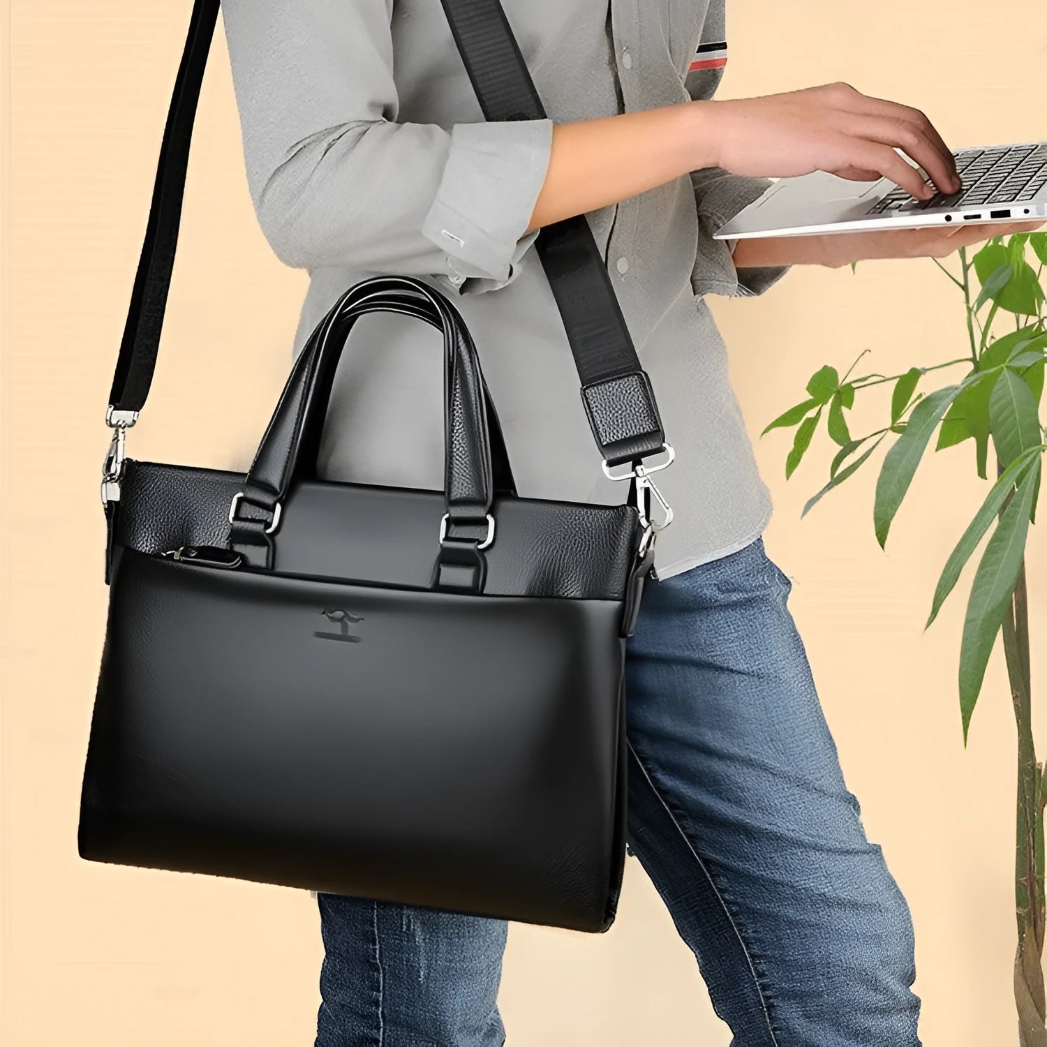 Black PU leather men's messenger shoulder bag with splicing design, 35x30x4cm.