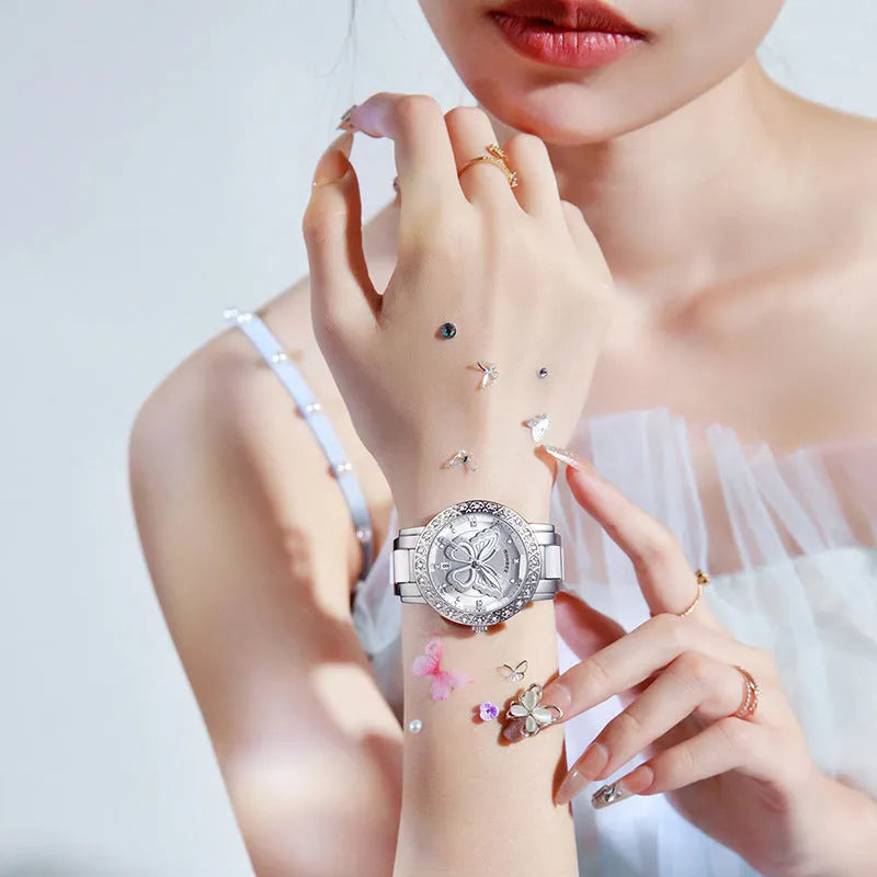 Butterfly diamond-encrusted women's watch with calendar and steel strap, 10mm thickness, available in white pink and purple face colours