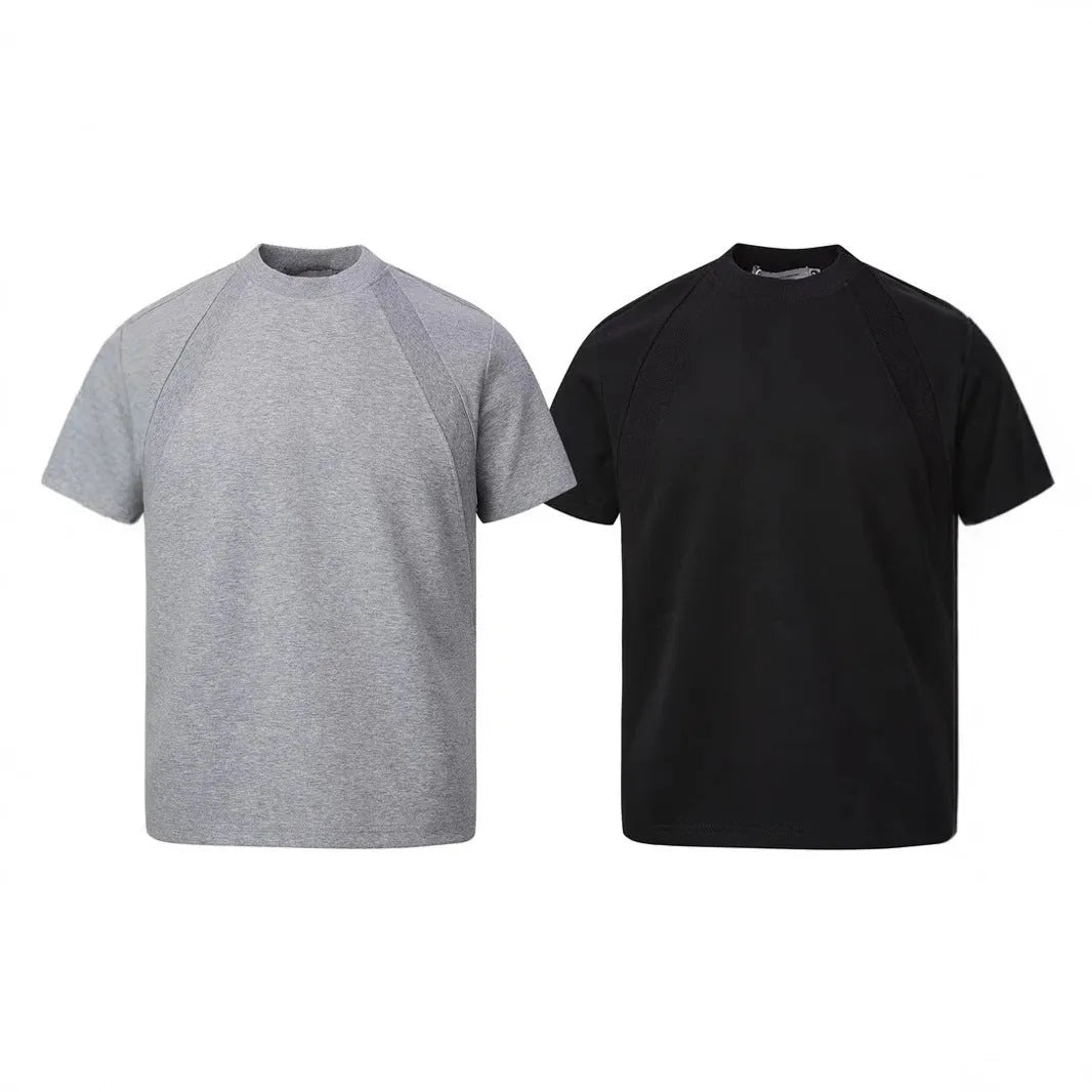 Loose-fit short sleeve top with textured air layer stitching in black.