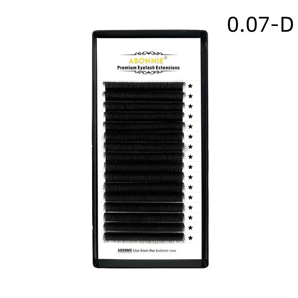 Pack of matte mink hair false eyelashes showing dense 16-row strip on a clear background.
