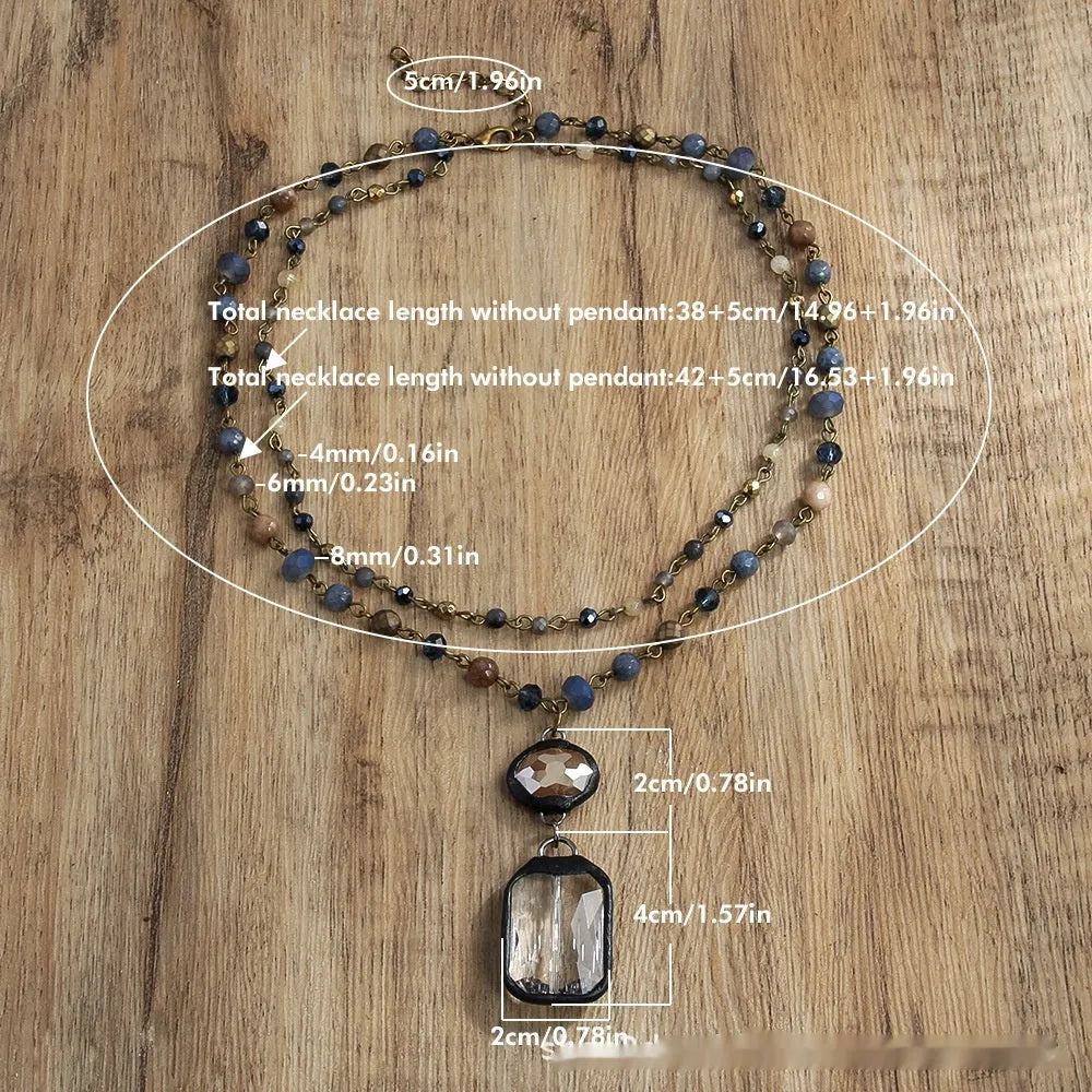 Tribal style necklace with two-layer pendant featuring natural stone and glass elements on chain