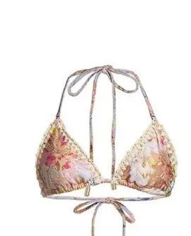 Women's creamy white floral print bikini set with top, briefs, and detachable skirt