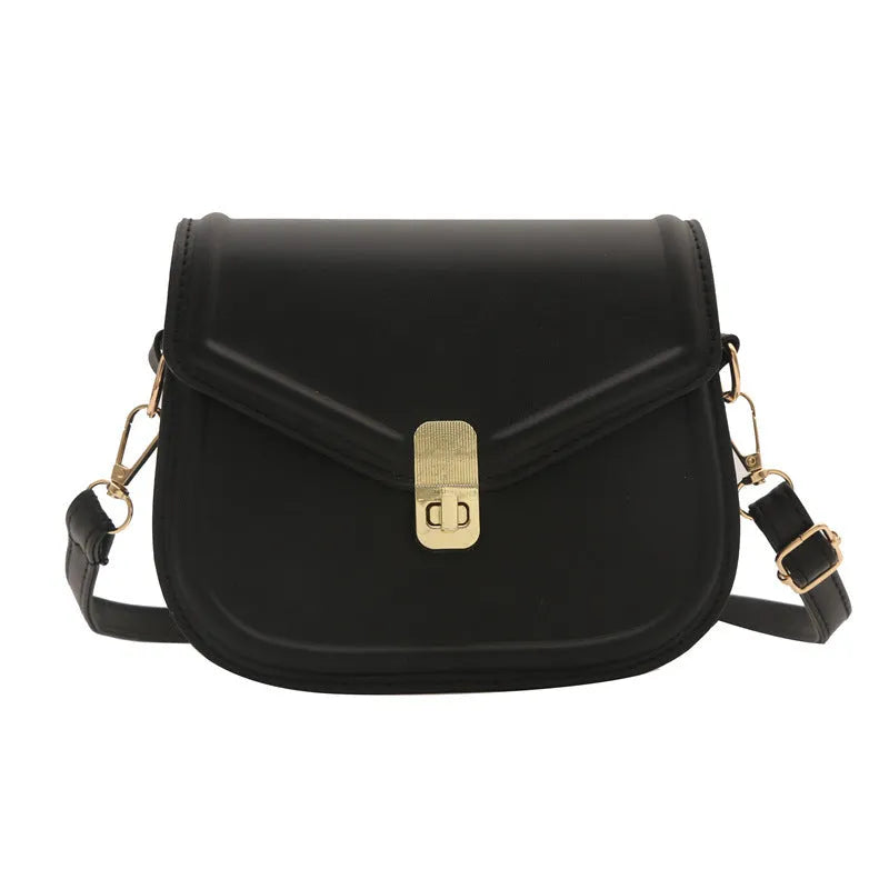 Soft horizontal square messenger bag in clamshell design, shown in black colour.
