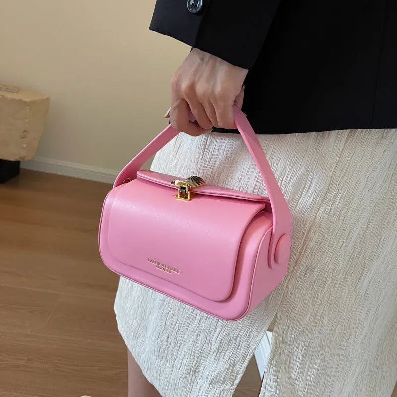 Personalised women's shoulder messenger bag in PU leather, shown in beige with a monogram letter and stitching detail.