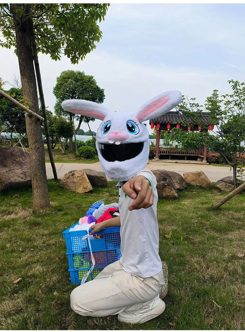 White decorative rabbit head helmet cover for electric motorcycles with plush lining.