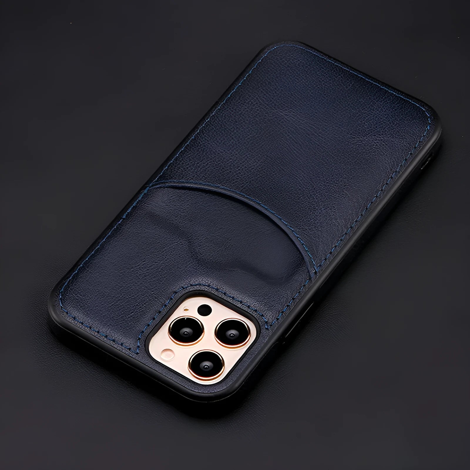 Dark blue PU leather protective phone case for iPhone on a table.