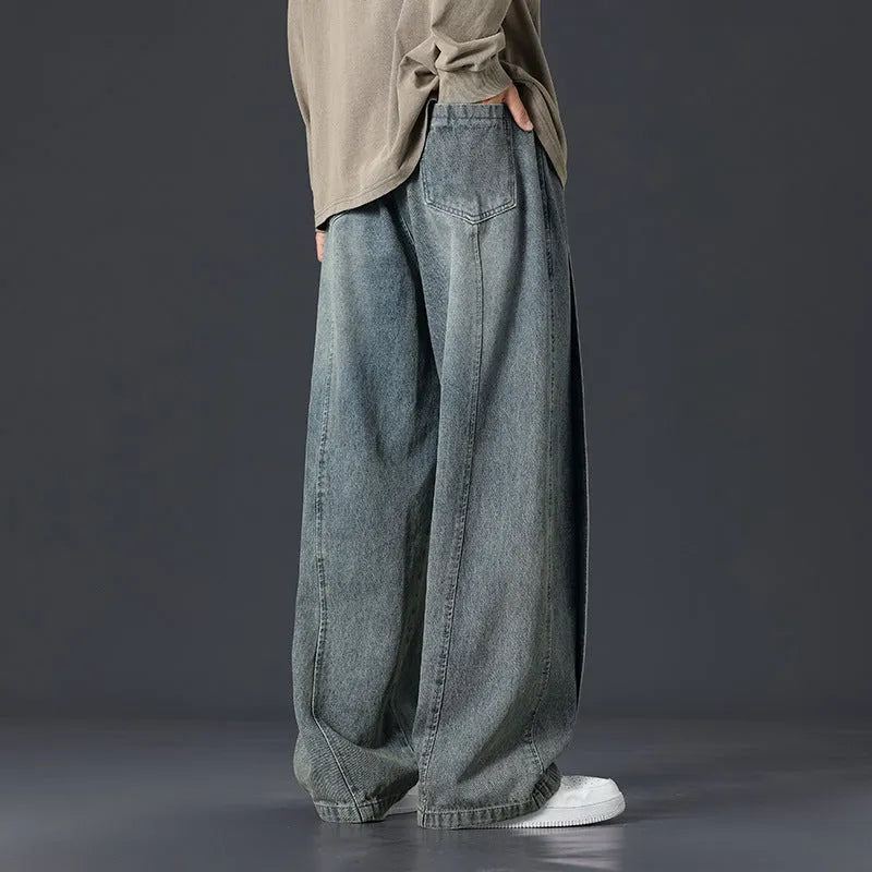 Retro patchwork washed oversized jeans for men in black, blue, and gray blue