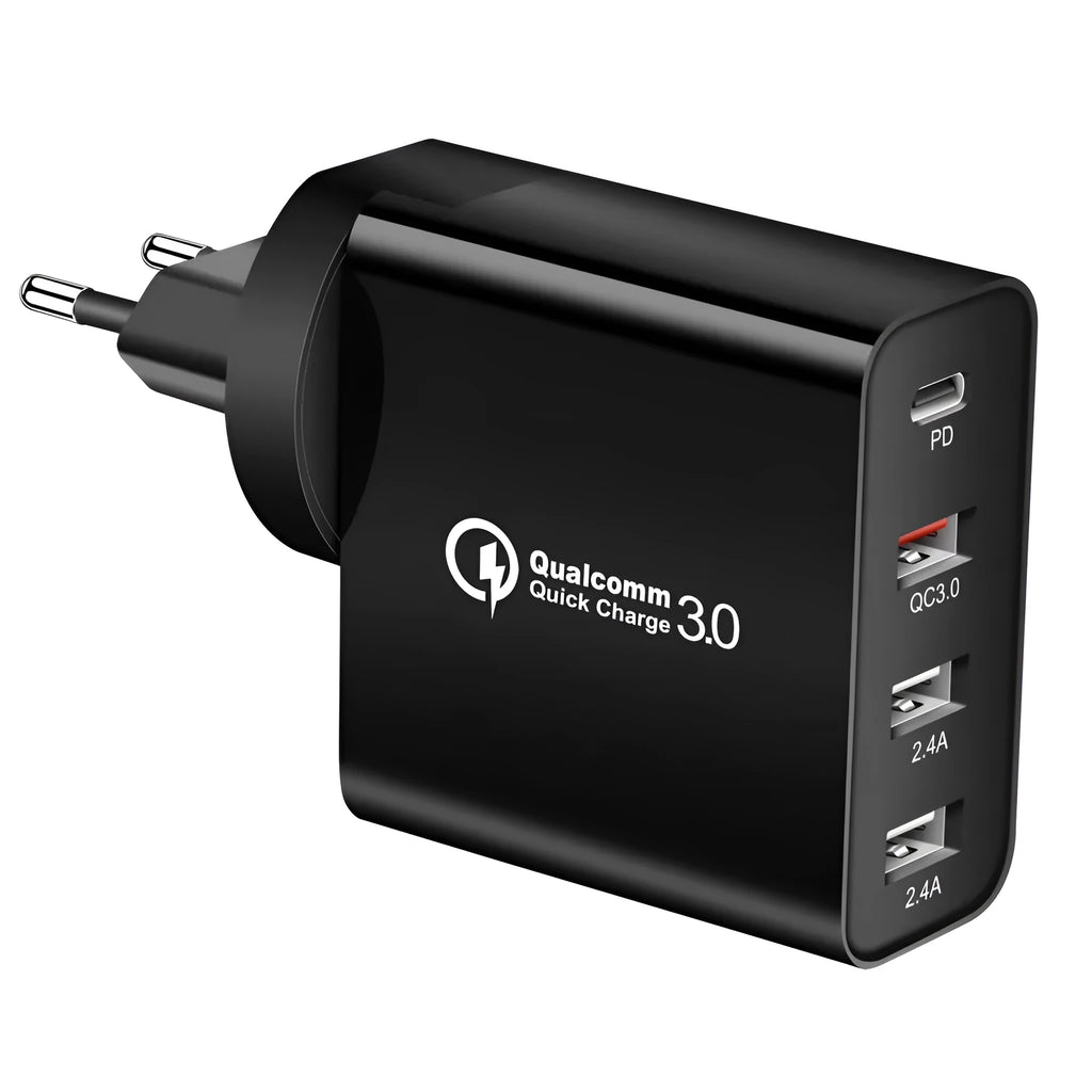 White multi-port fast charger with USB-C and USB-A ports plugged into a wall socket.