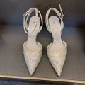 Women's silver and black hollow high heels with red sole and pointed stiletto heel