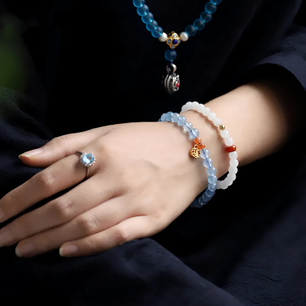 Women's bracelet with 8mm ice translucent aquamarine crystal beads and sequin details