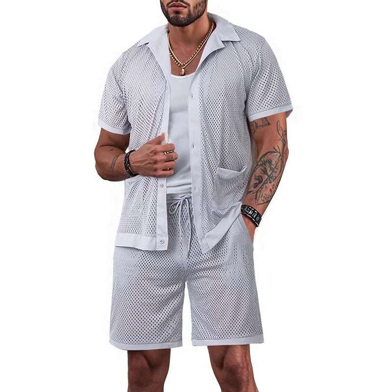Lightweight women's beach shorts suit set in lake blue, showing short sleeve jacket and matching shorts.
