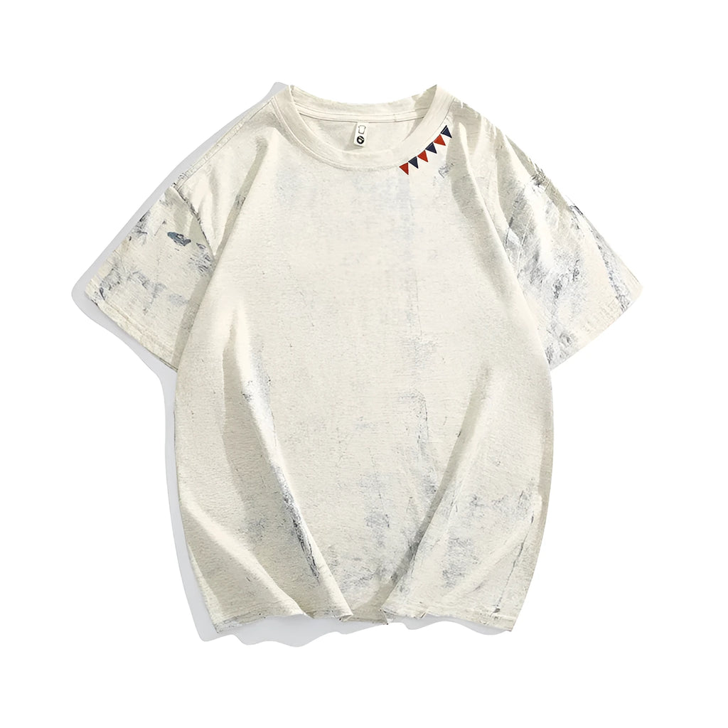 Grey loose fit short sleeve t-shirt with a full body tie dye pattern, showing round neck collar.