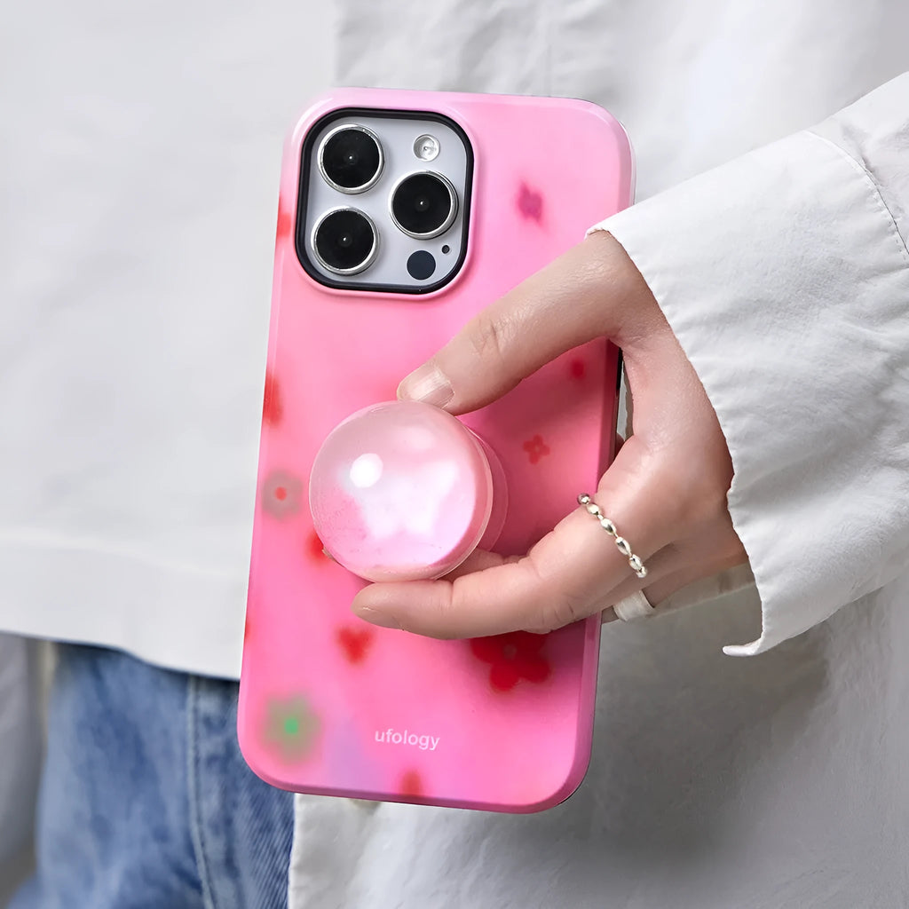 Butterfly flowing sand TPU phone case with fall prevention, shown for iPhone model