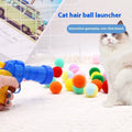Pet toy launching gun with multiple soft plush balls for interactive dog and cat play