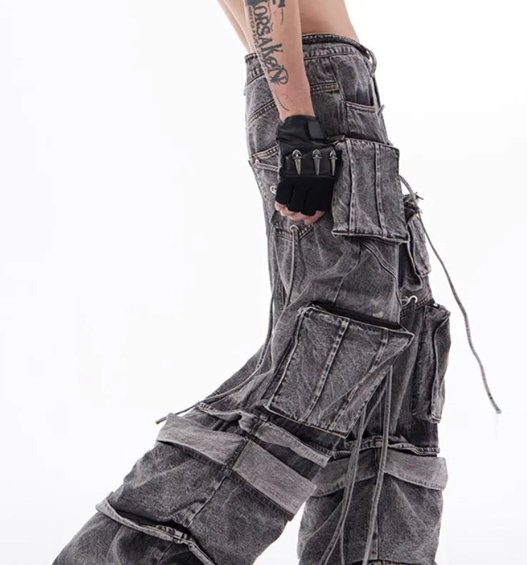Grey distressed denim men's overalls with rope stitching detail on the front
