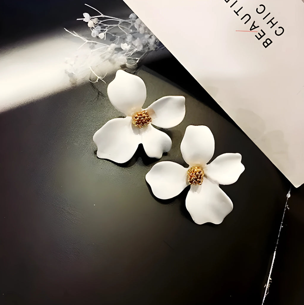 Women's flower stud earrings in alloy with electroplated white or pink finish