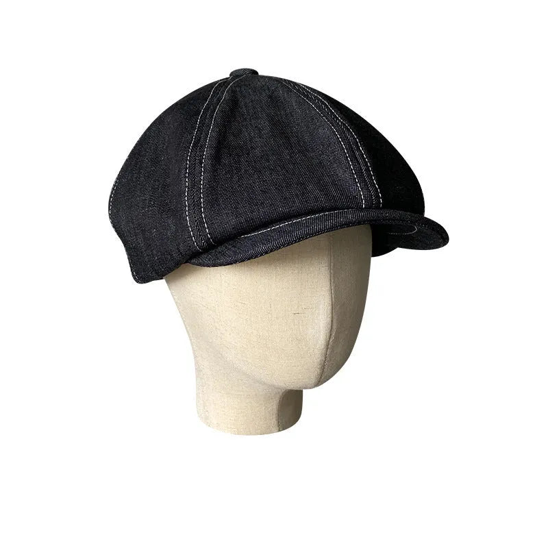 Black cotton Japanese denim beret hat with retro octagonal design shown on adult model