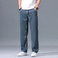 Men's loose straight leg lyocell jeans in light blue colour with zipper fly closure