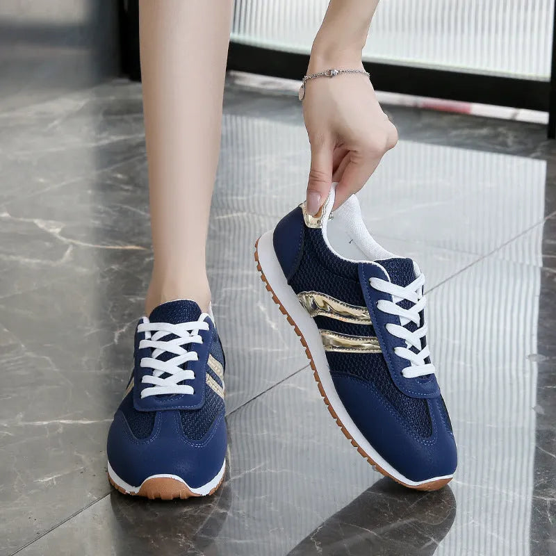 Blue women's casual sports shoes with cross shoulder straps and flat rubber sole