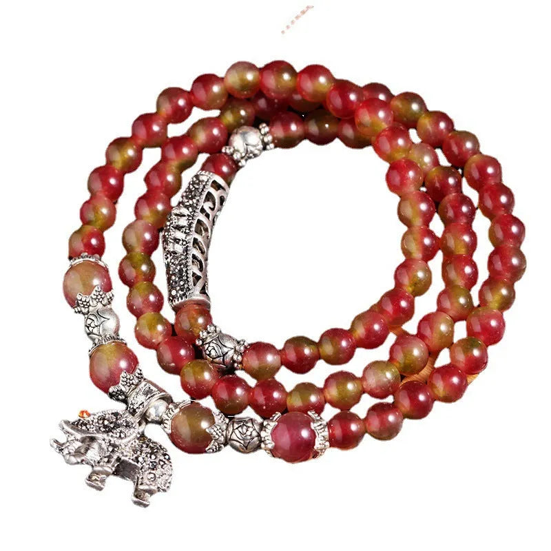 Natural watermelon crystal Chinese knot bracelet with elephant-style beads