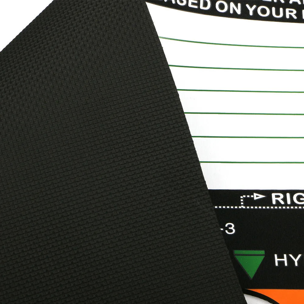 Black neoprene golf swing posture training pad on a practice surface