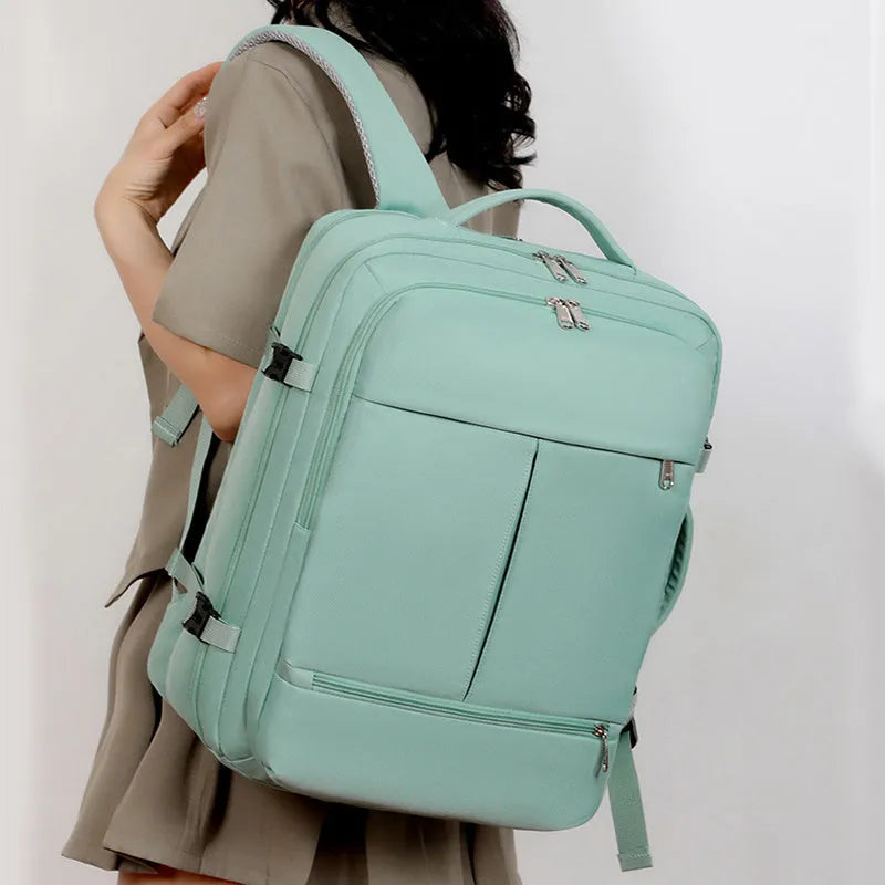 Large waterproof oxford backpack showing multiple pockets and 15.6 inch laptop compartment in available colours