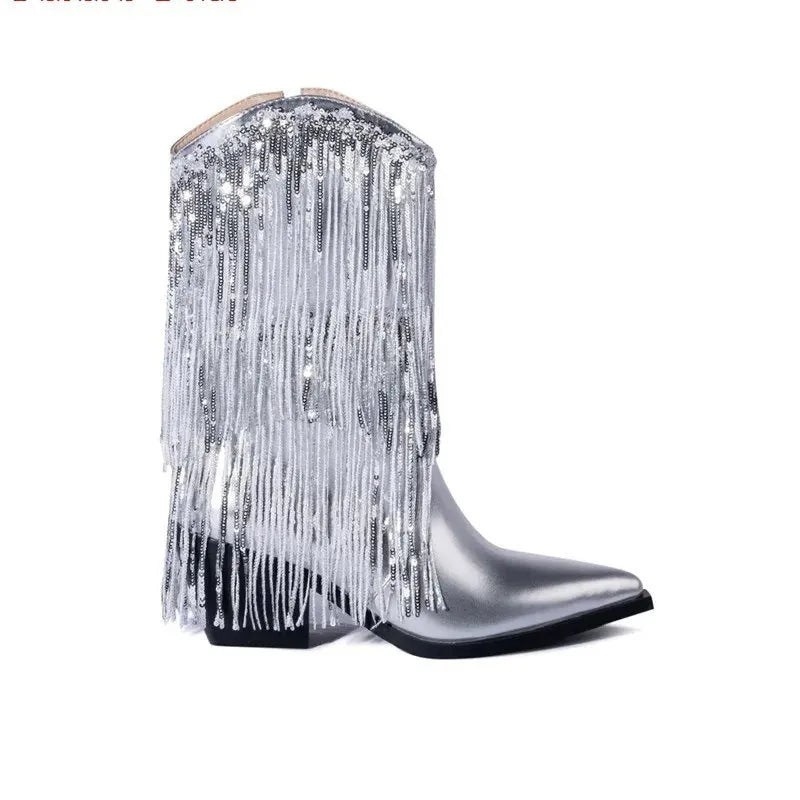 Women's black ankle boots with tassel detail, chunky stiletto heel, and pointed toe on a white background.