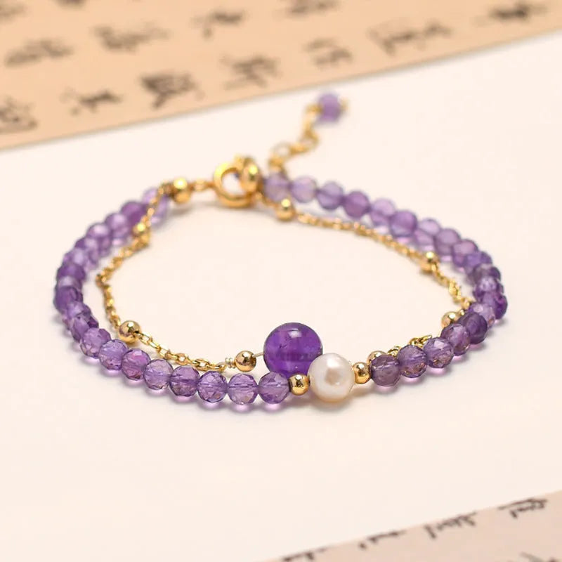 Purple amethyst crystal bracelet with diamond-shaped beads in a Chinese style design.
