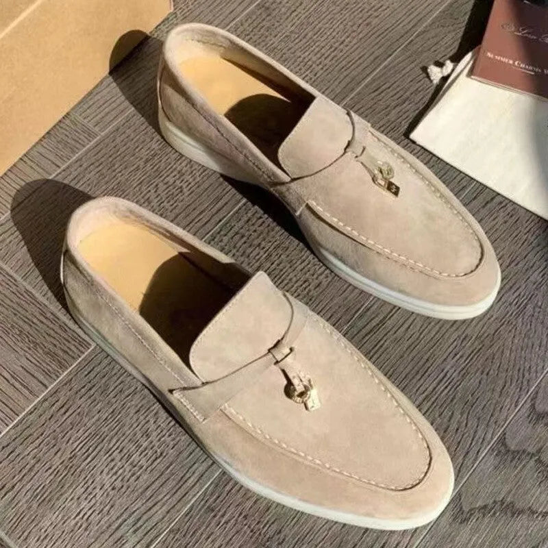 Gommino slip-on casual loafers with round toe, steel-head detail, and artificial PU upper