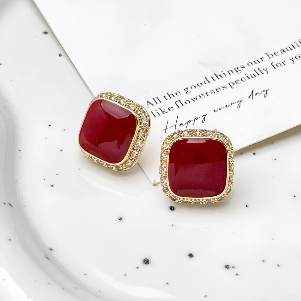 Red square alloy earrings with geometric inlaid design and sweet-cool hybrid style