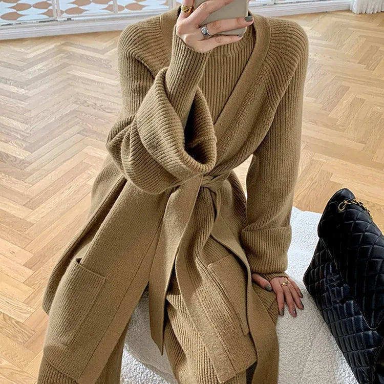 Women's knitted three-piece set showing sweater, wide-leg pants, and cardigan with leather stitching details