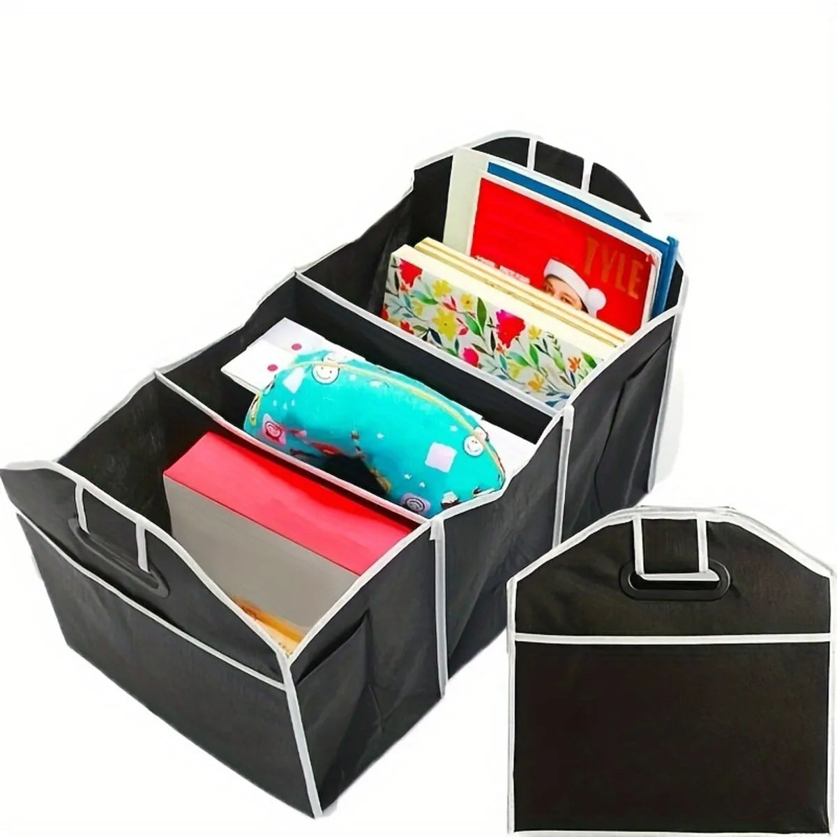Black car multi-pocket trunk organiser with foldable lid and tie-down straps on car boot floor