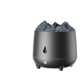 Black volcano-shaped ultrasonic humidifier and aroma diffuser with USB cable on a wooden table.