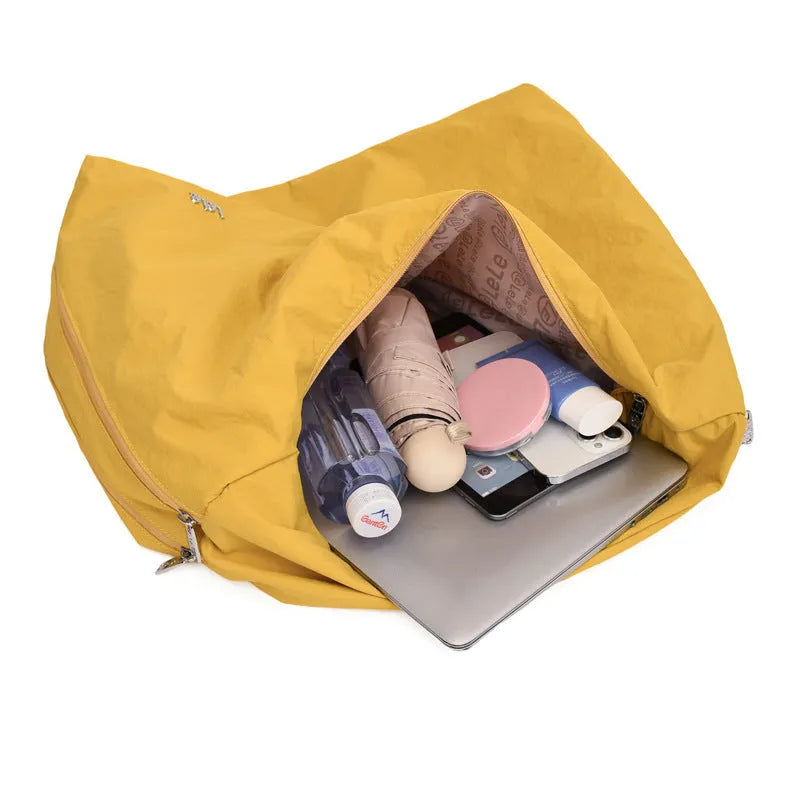 Women's heart-shaped nylon underarm bag in black, yellow, khaki and blue colours with large capacity