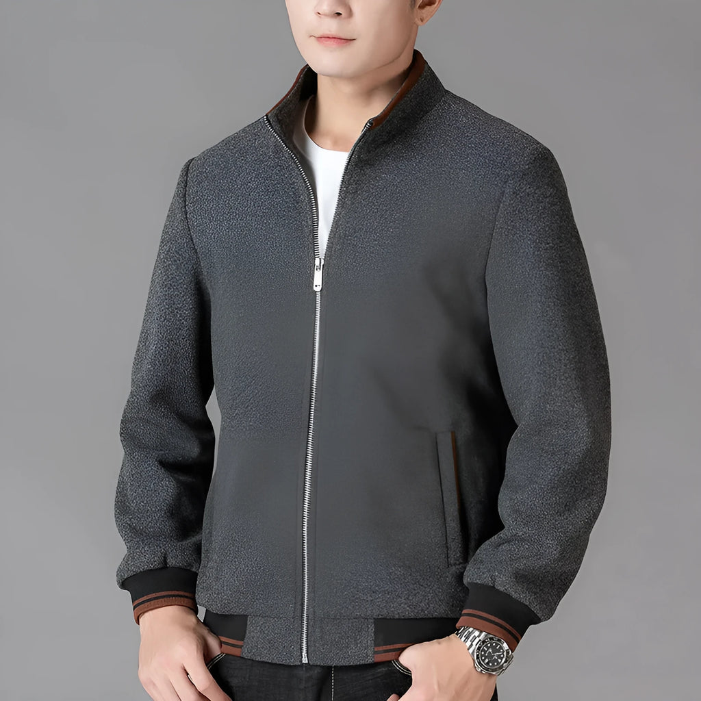 Men's gray polyester fleece autumn coat with long sleeves and side pockets in a sports style.