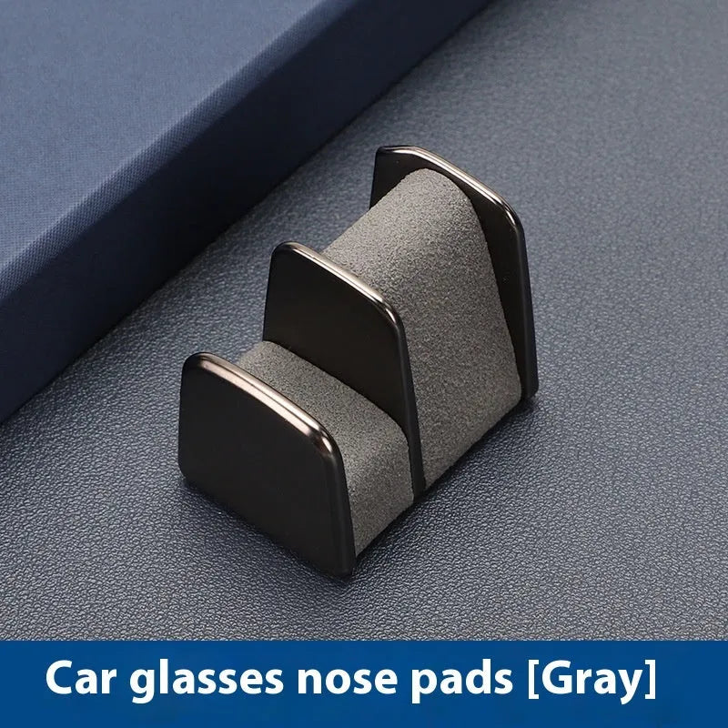 Car dashboard sunglasses clip nose pad in four colour options with zinc alloy and leather construction