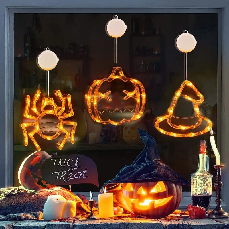Halloween window hanging LED lights set with seven designs including spiders, pumpkins, and ghosts