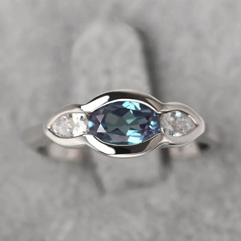 Women's geometric ellipse ring with white gold colour finish and inlaid zircon stones