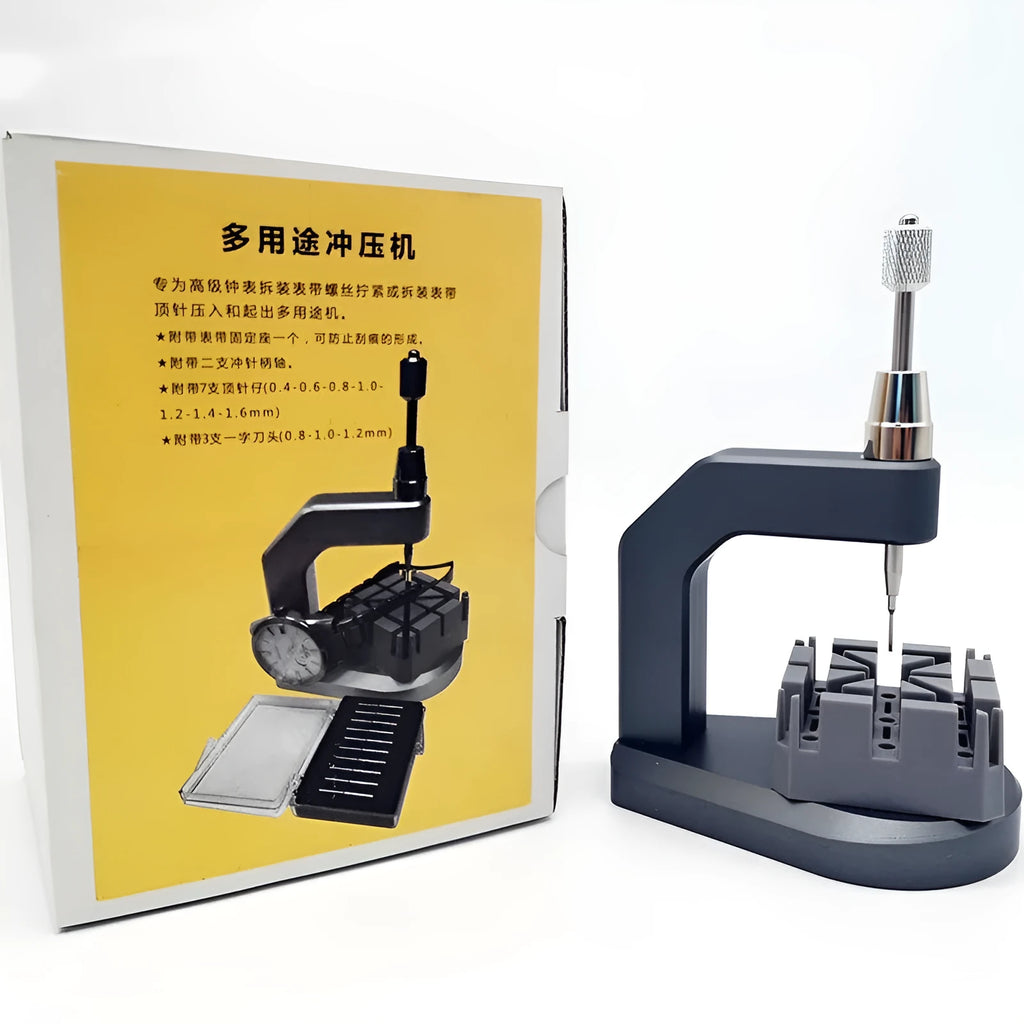Silver tool steel multi-purpose press strap removal tool with 0.50-1.60mm blade on a workshop surface.