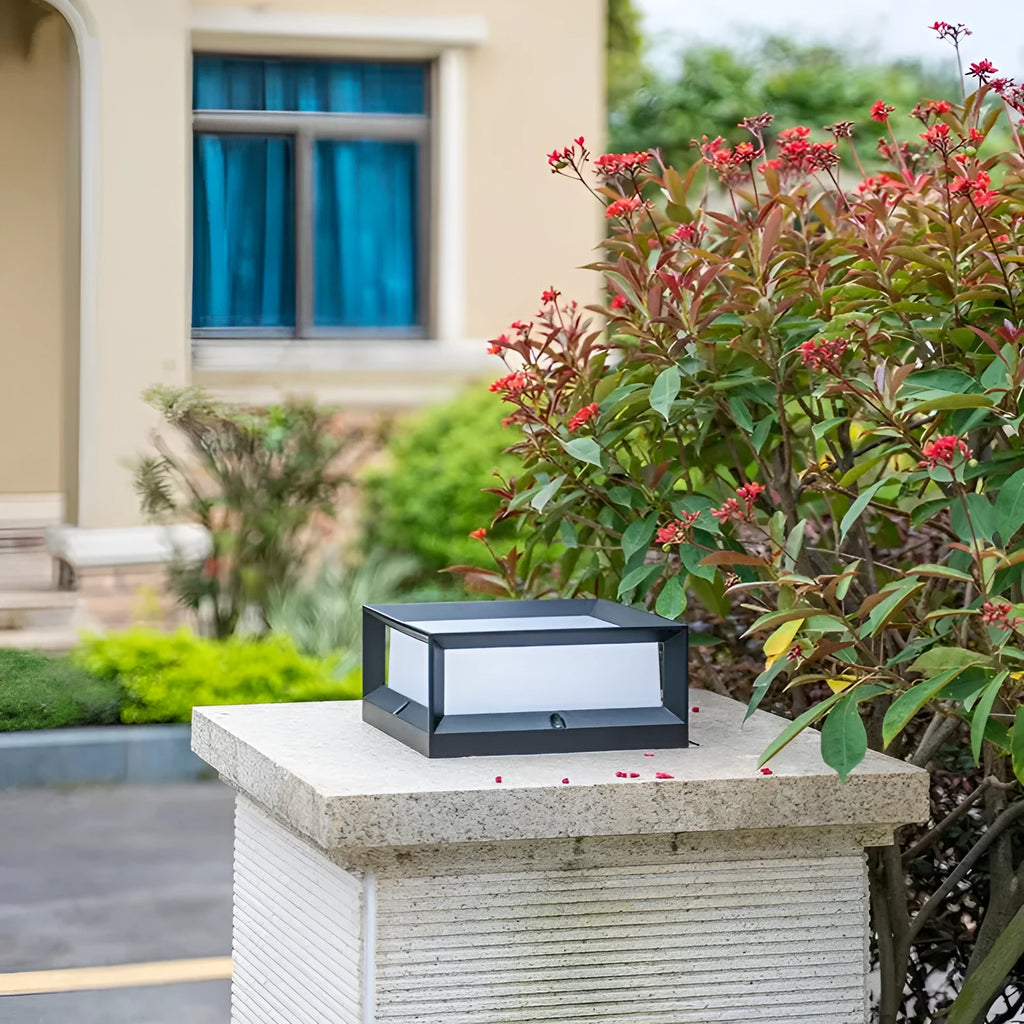 Aluminium outdoor solar column light with LED, shown in garden setting.