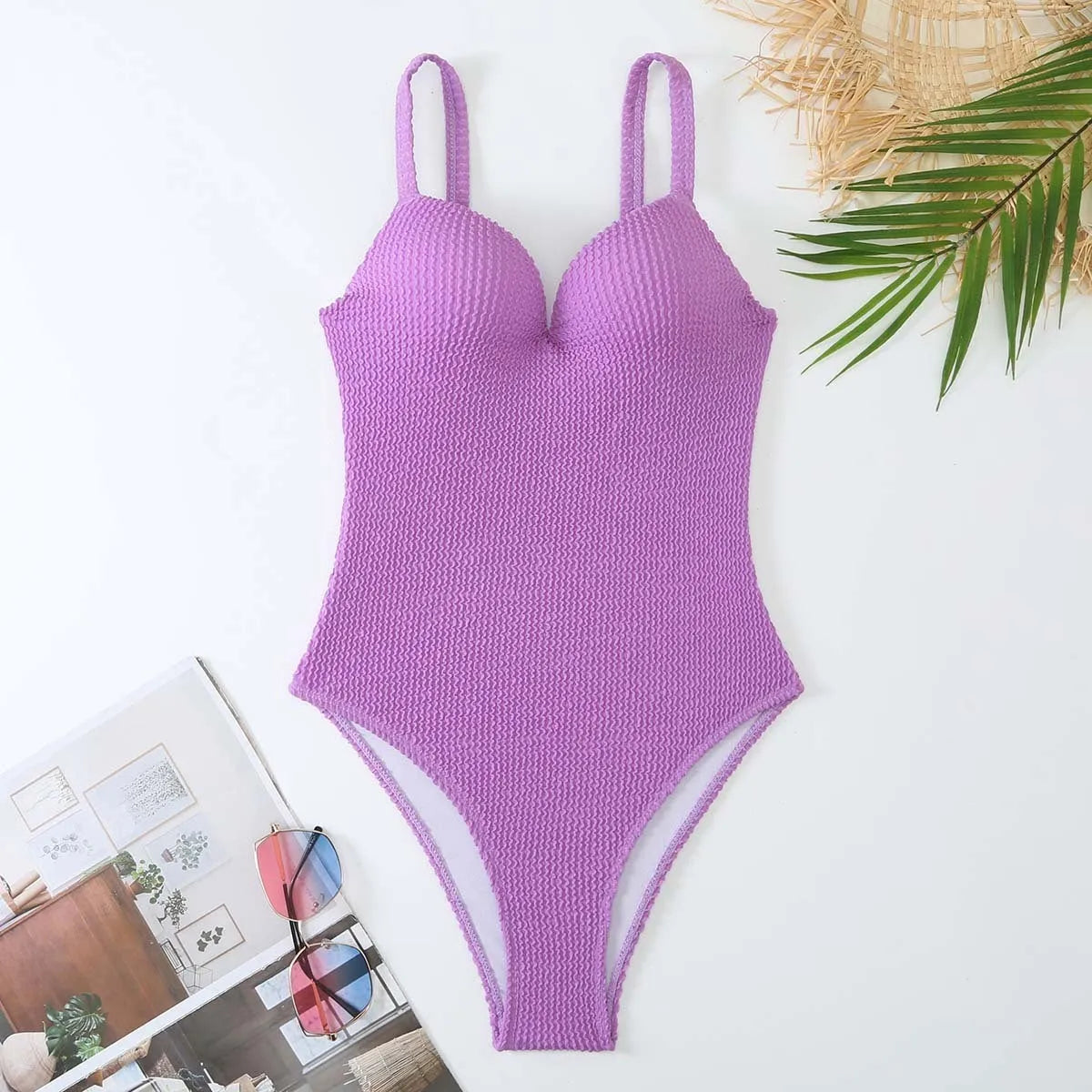 Women's black one-piece swimsuit with sunken stripe design for swimming activities