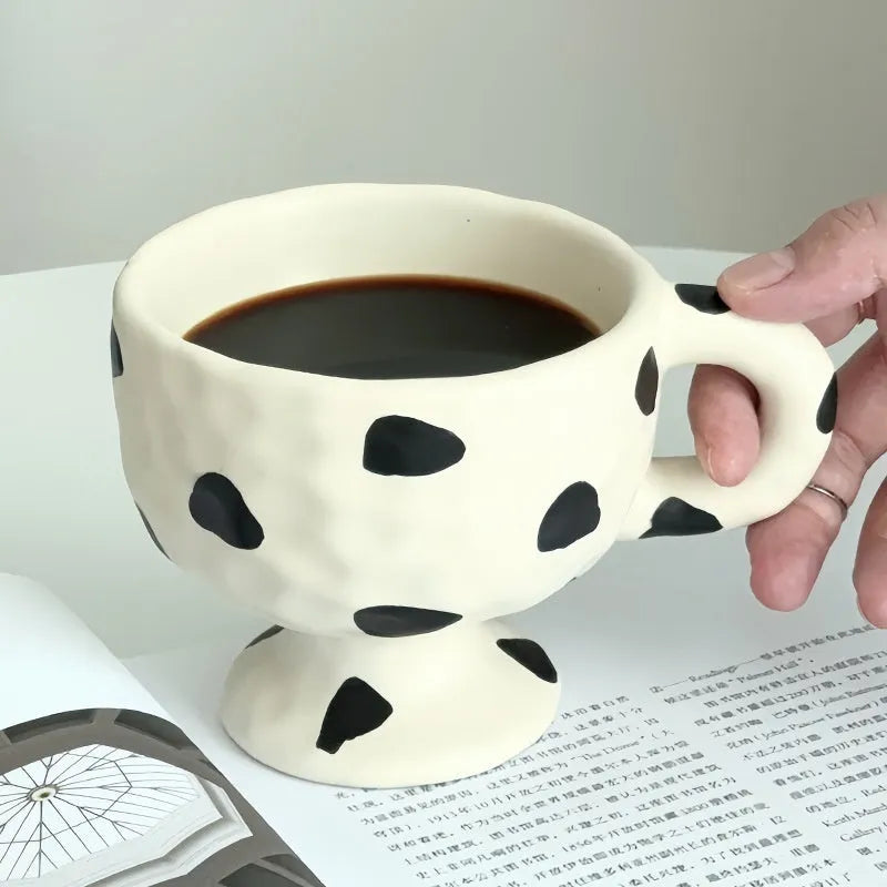 Irregular handmade ceramic mug in solid colour with approximately 250ml capacity